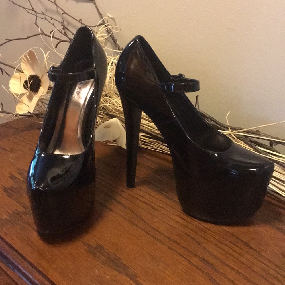 Sleek black platform heels